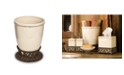 The GG Collection Small Cream Ceramic Wastebasket With Acanthus Leaf Metal Base